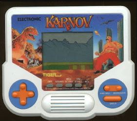 Karnov Dinosaur Fighting Tiger Handheld Travel Game Electronic LCD