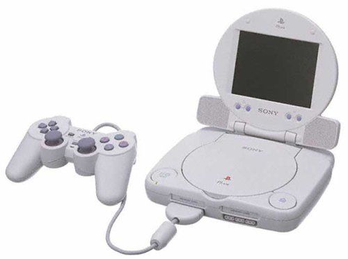 PSOne Combo + 1 Manette + 2 Memorycards + House